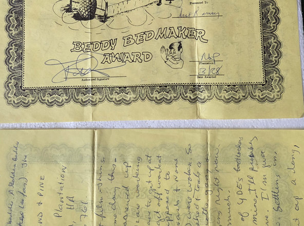 Letter on the back of camp award